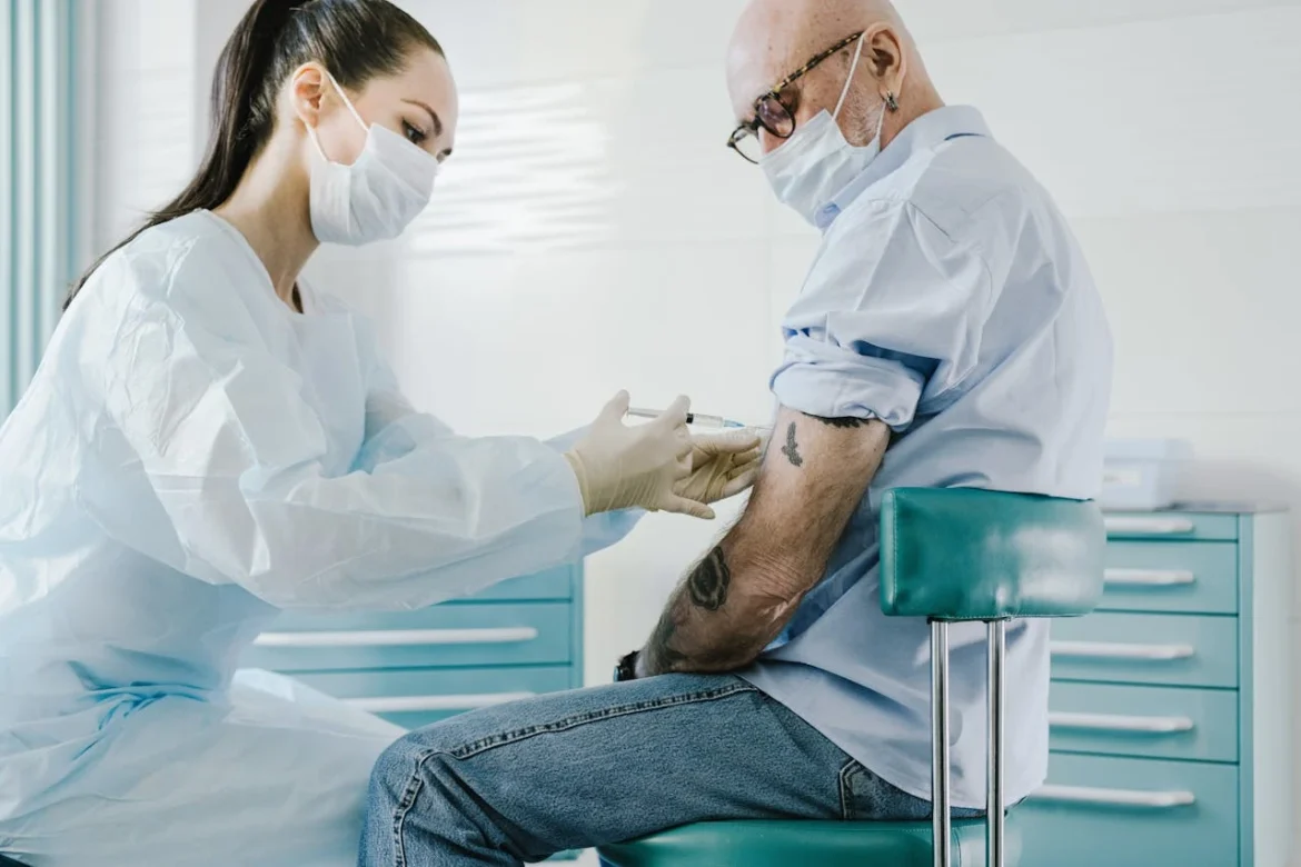 pexels-shvets-production-8413291 Difference Between Medicare and Medicaid: A Comprehensive Guide A Doctor Injecting a Patient